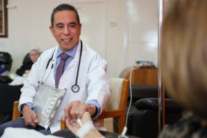 Physician meeting with a visitor